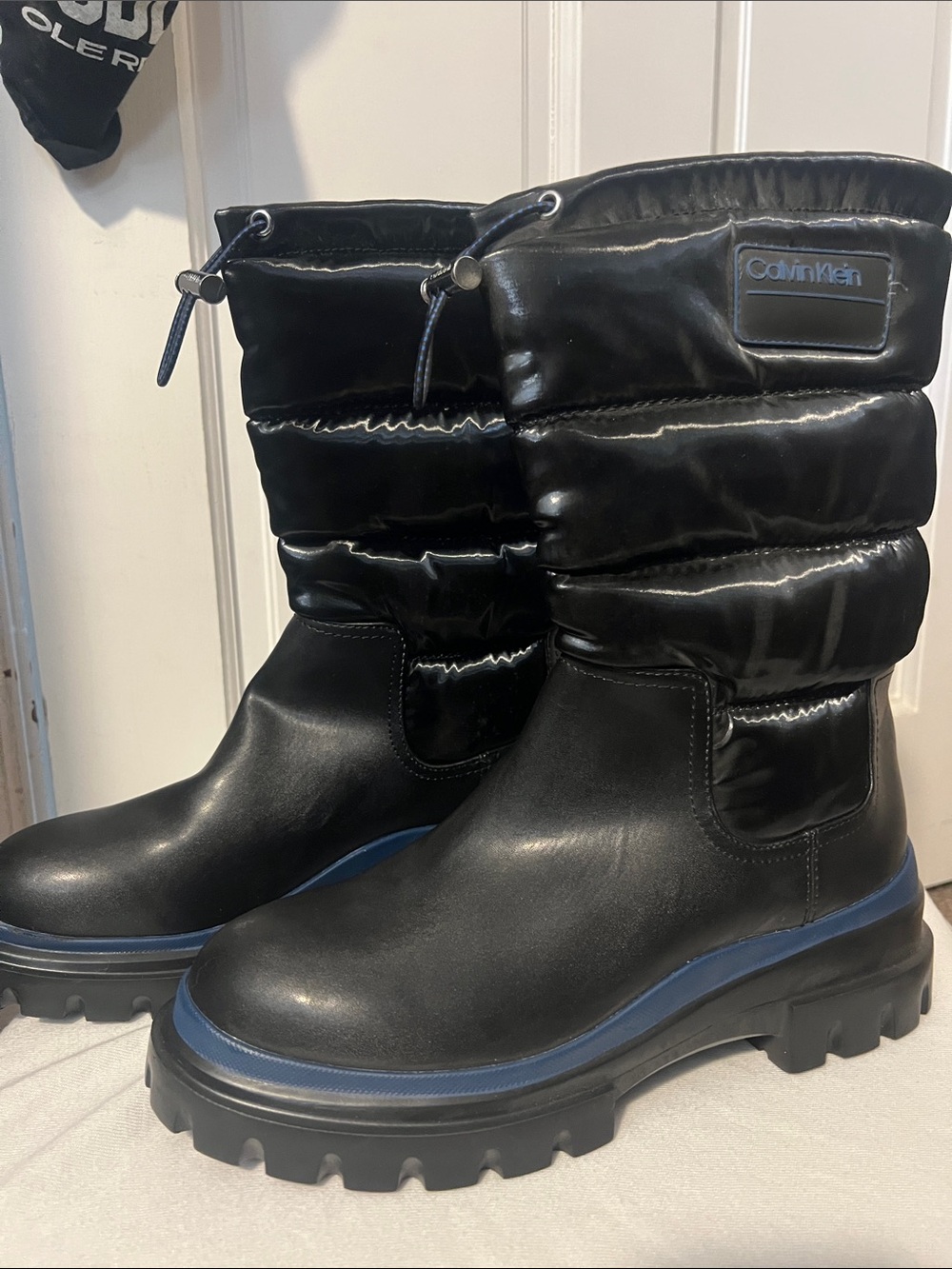 Calvin Klein Black Quilted Mid-Calf Winter Boots with Blue Trim